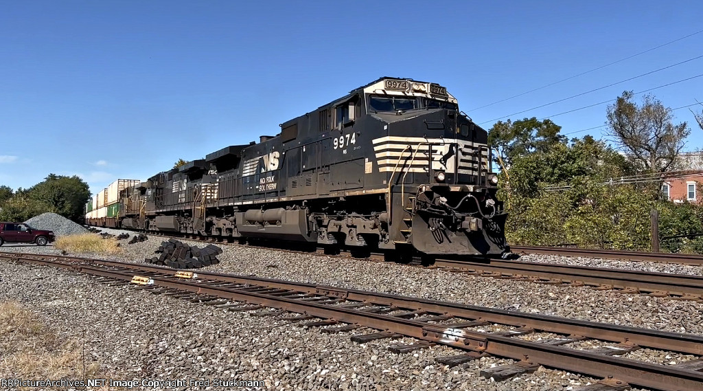 NS 9974 leads these stacks east.